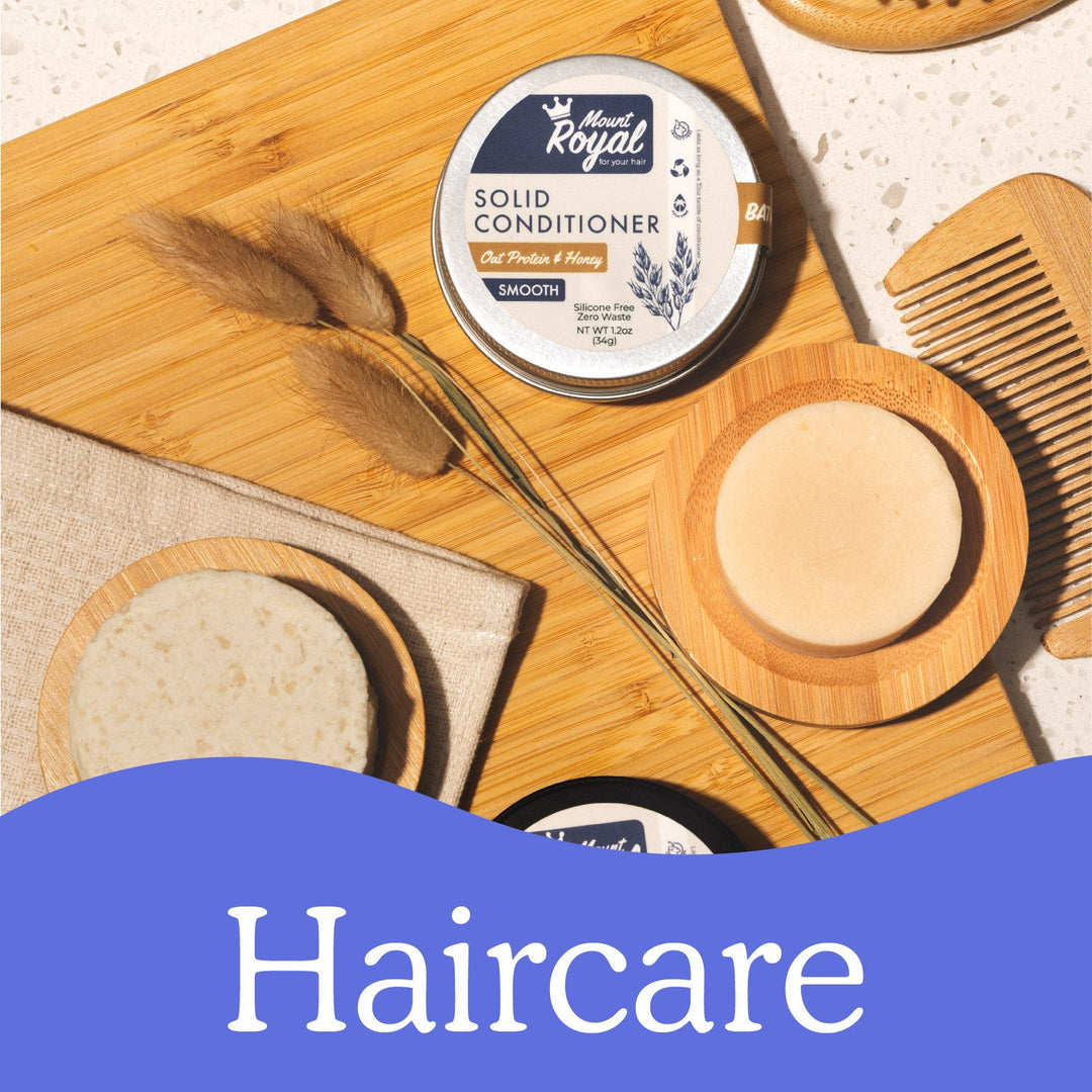 Mount Royal solid shampoo and conditioner bars on bamboo dishes with a blue Haircare banner.