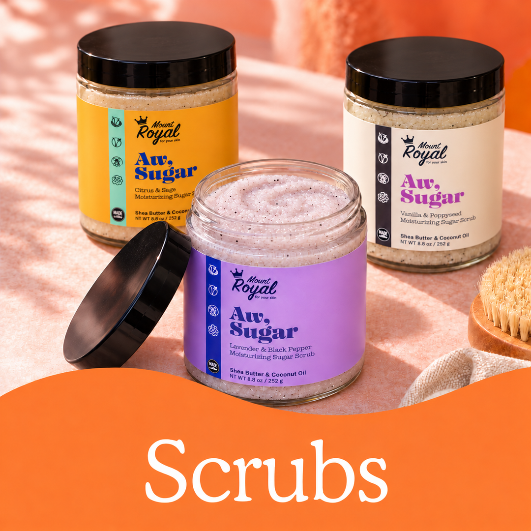 Mount Royal Citrus & Sage, Lavender & Black Pepper, and Vanilla & Poppyseed sugar scrubs in matching jars with current packaging, including an open jar of creamy scrub.