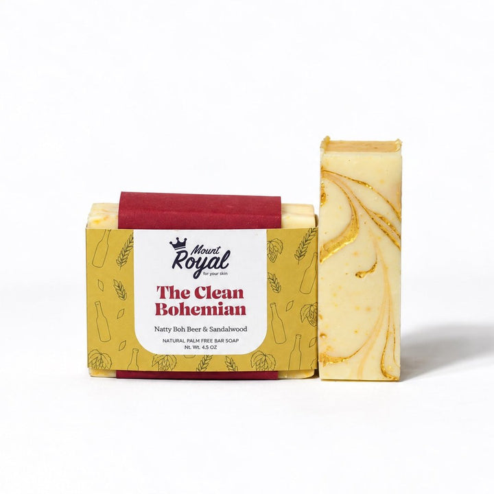 Mount Royal The Clean Bohemian Natty Boh beer and sandalwood bar soap with gold botanical packaging on a white background
