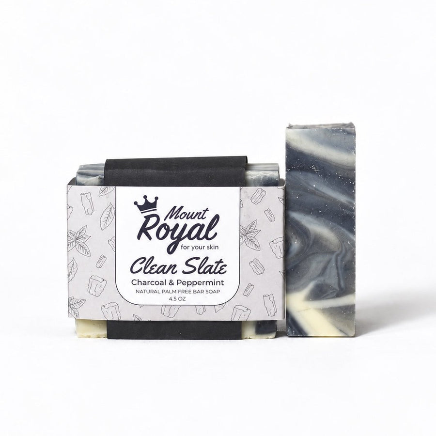 Mount Royal Clean Slate charcoal and peppermint bar soap with botanical packaging on a white background