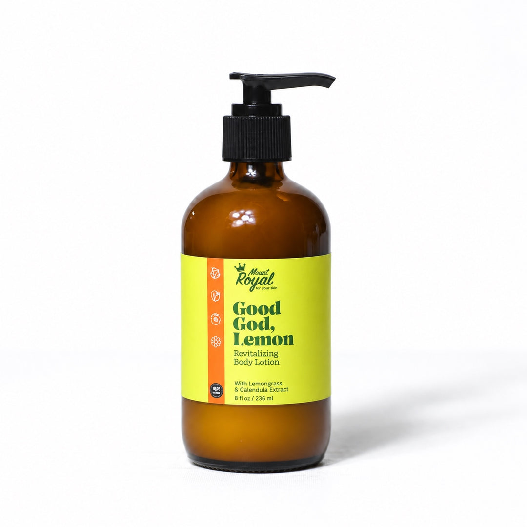 Mount Royal Good God, Lemon body lotion in an amber glass pump bottle on a white background