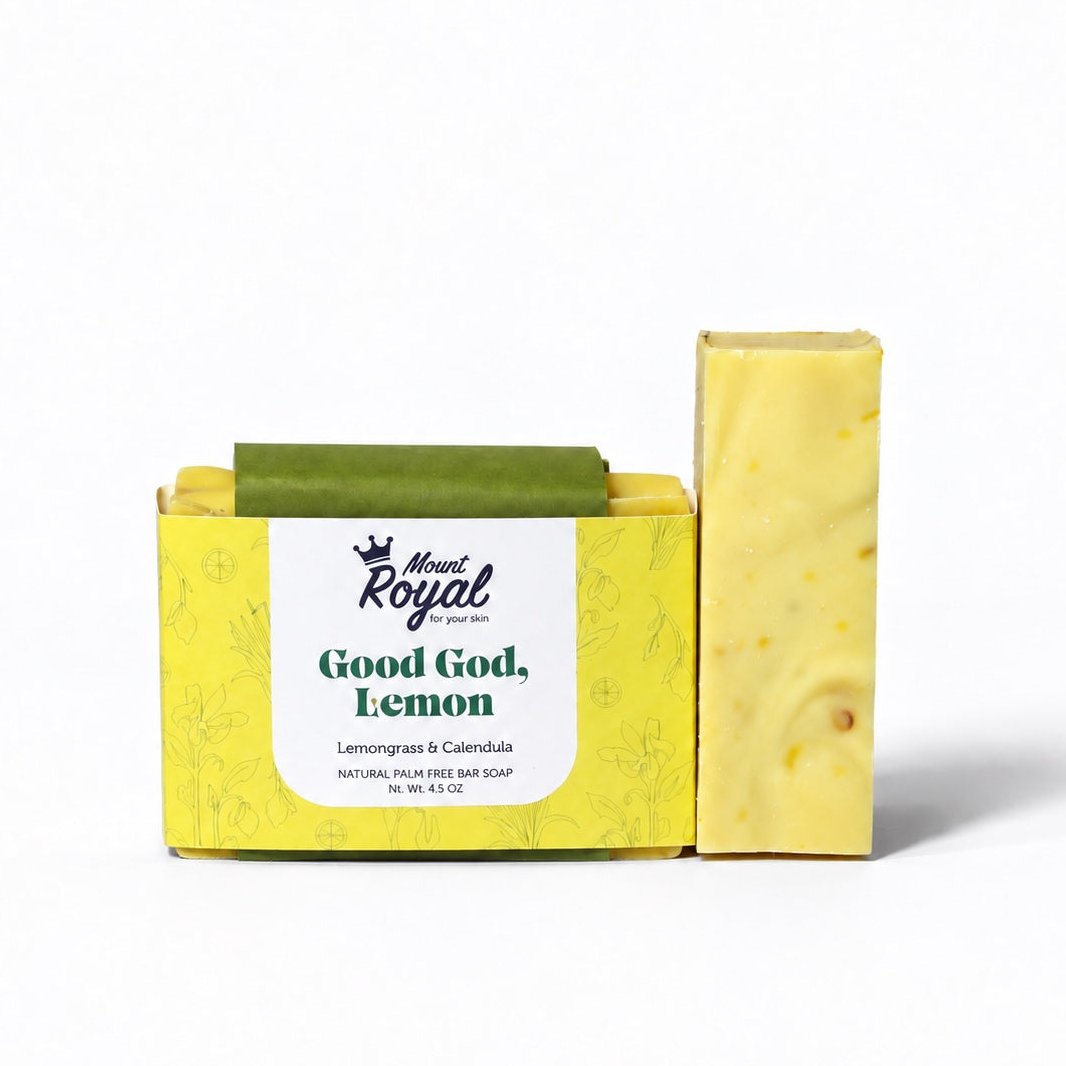 Mount Royal Good God, Lemon lemongrass and calendula bar soap with yellow botanical packaging on a white background