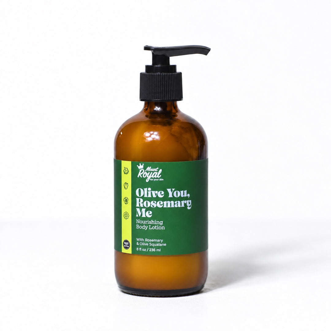 Mount Royal Olive You, Rosemary Me body lotion in an amber glass pump bottle on a white background
