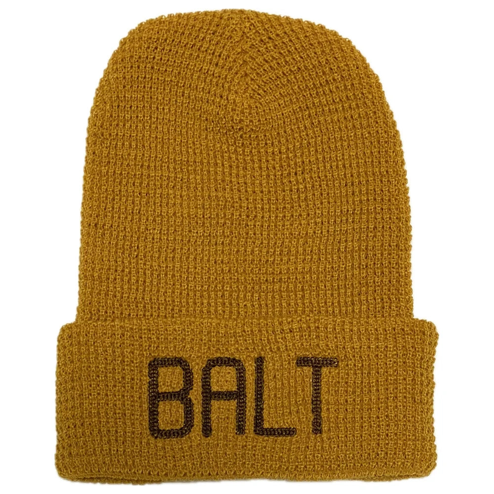 Mustard yellow / camel color knit beanie with 'BALT' embroidery