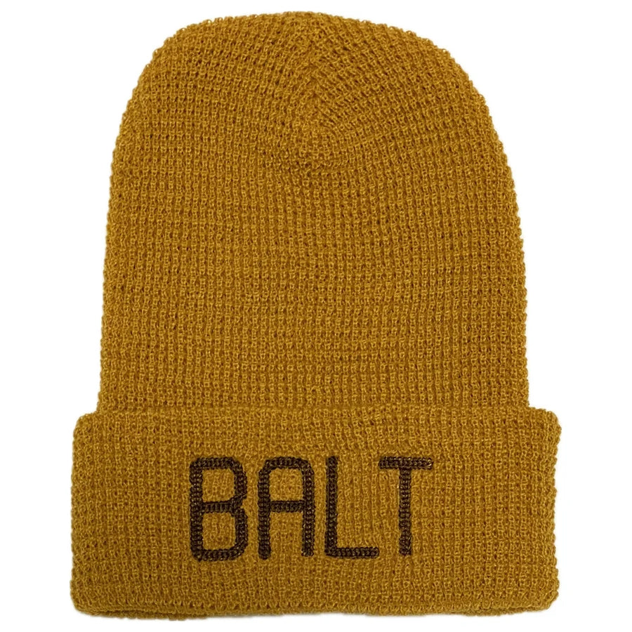 Mustard yellow / camel color knit beanie with 'BALT' embroidery