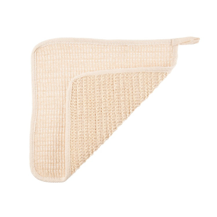 Tan ramie wash cloth with fold.