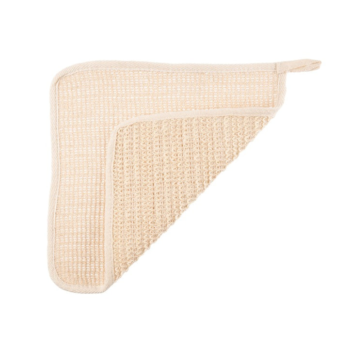 Tan ramie wash cloth with fold.